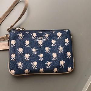Coach blue and white floral wristlet